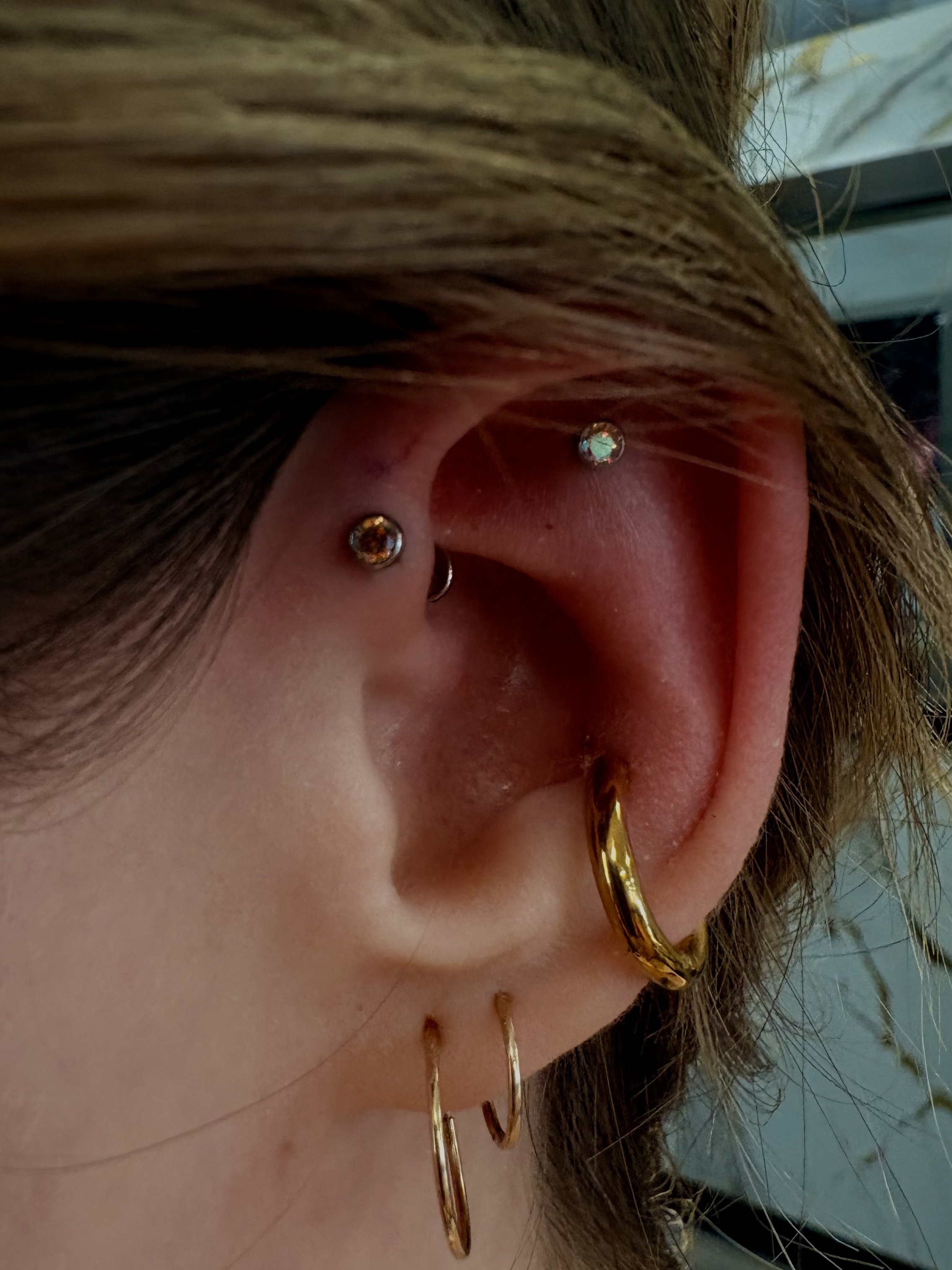 Crystal helix stud with amber conch ring and gold lobe hoops