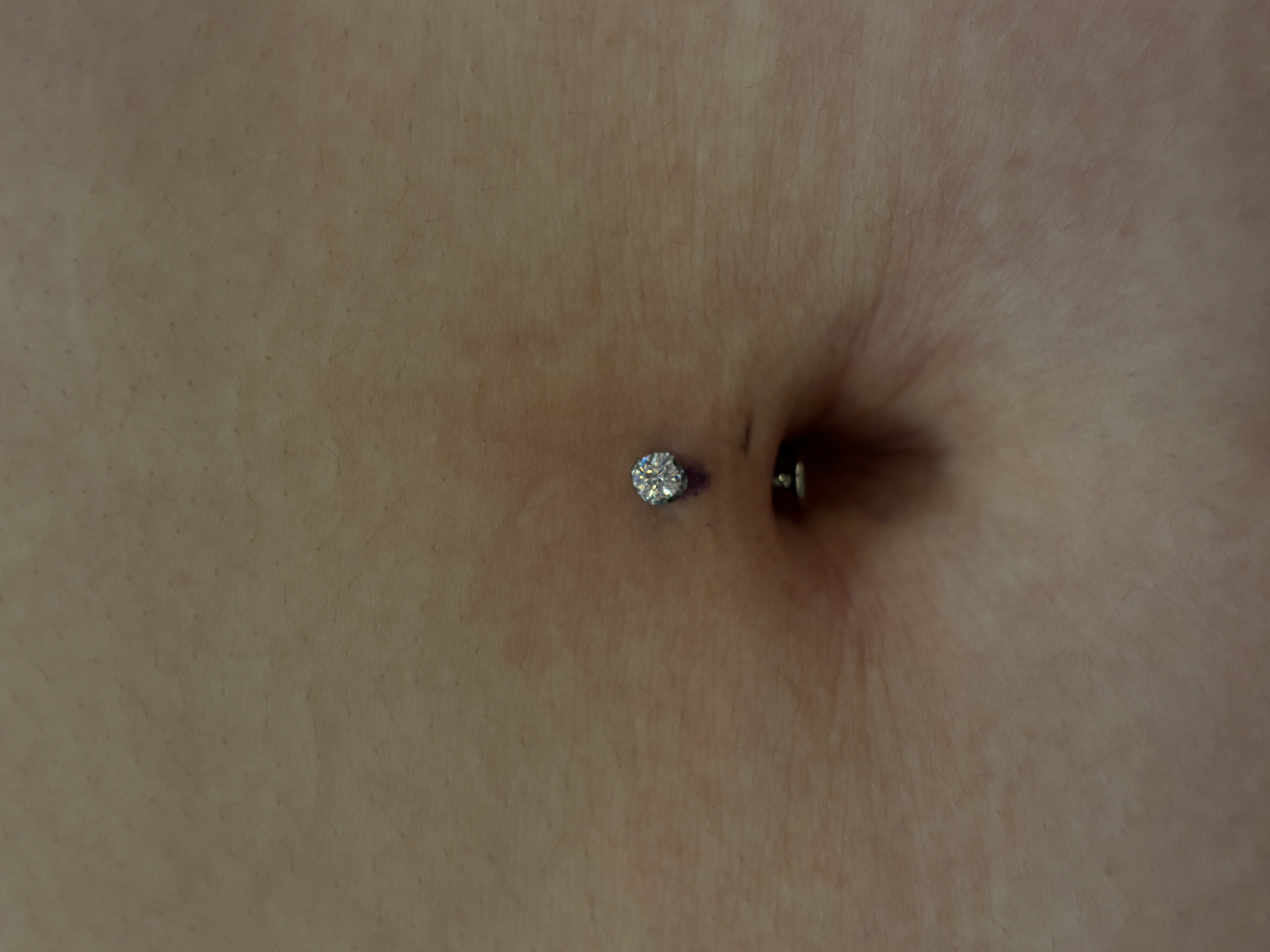 Navel piercing with crystal ball top