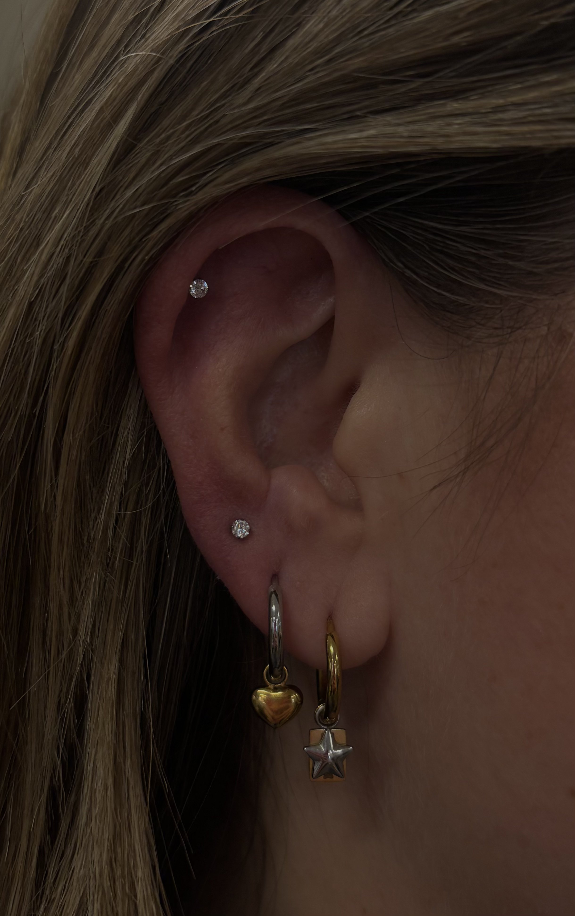 Curated ear with heart and star charm hoops and crystal studs