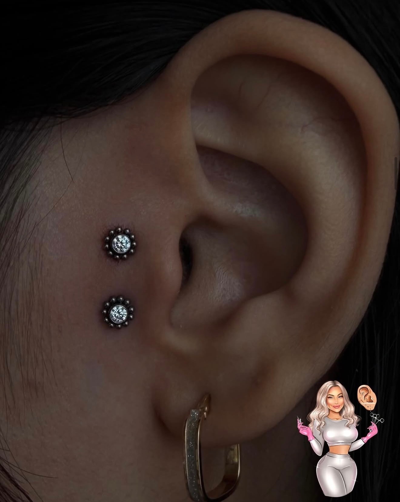 Close-up body piercing with gold jewelry